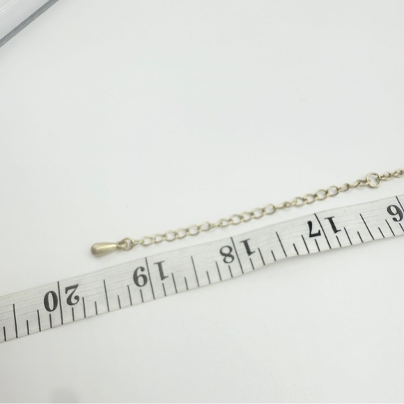 LIA SOPHIA Matte Gold Tone Hammered
Disk Signed Necklace - Picture 10 of 10